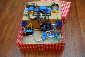 The internals of the "It's a Trap" box. Blue Painters tape is a great/terrible means of mounting stuff.